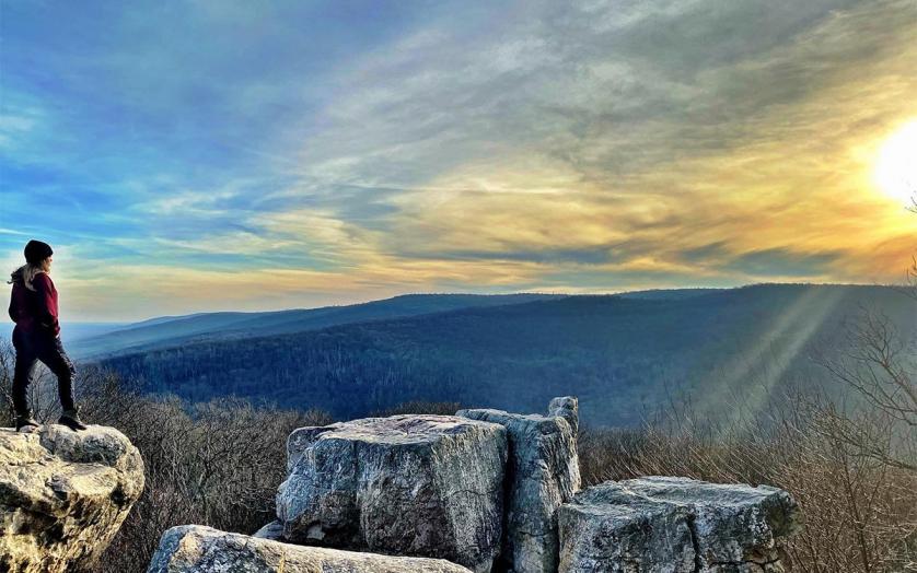 woman standing on Chimney Rock