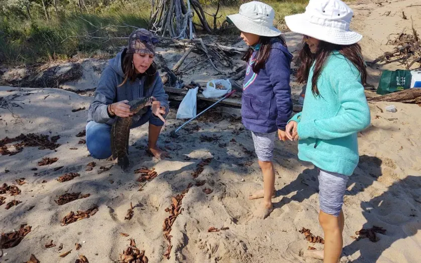 A woman from Megalodon Adventures is sharing information about the Snakehead fish.